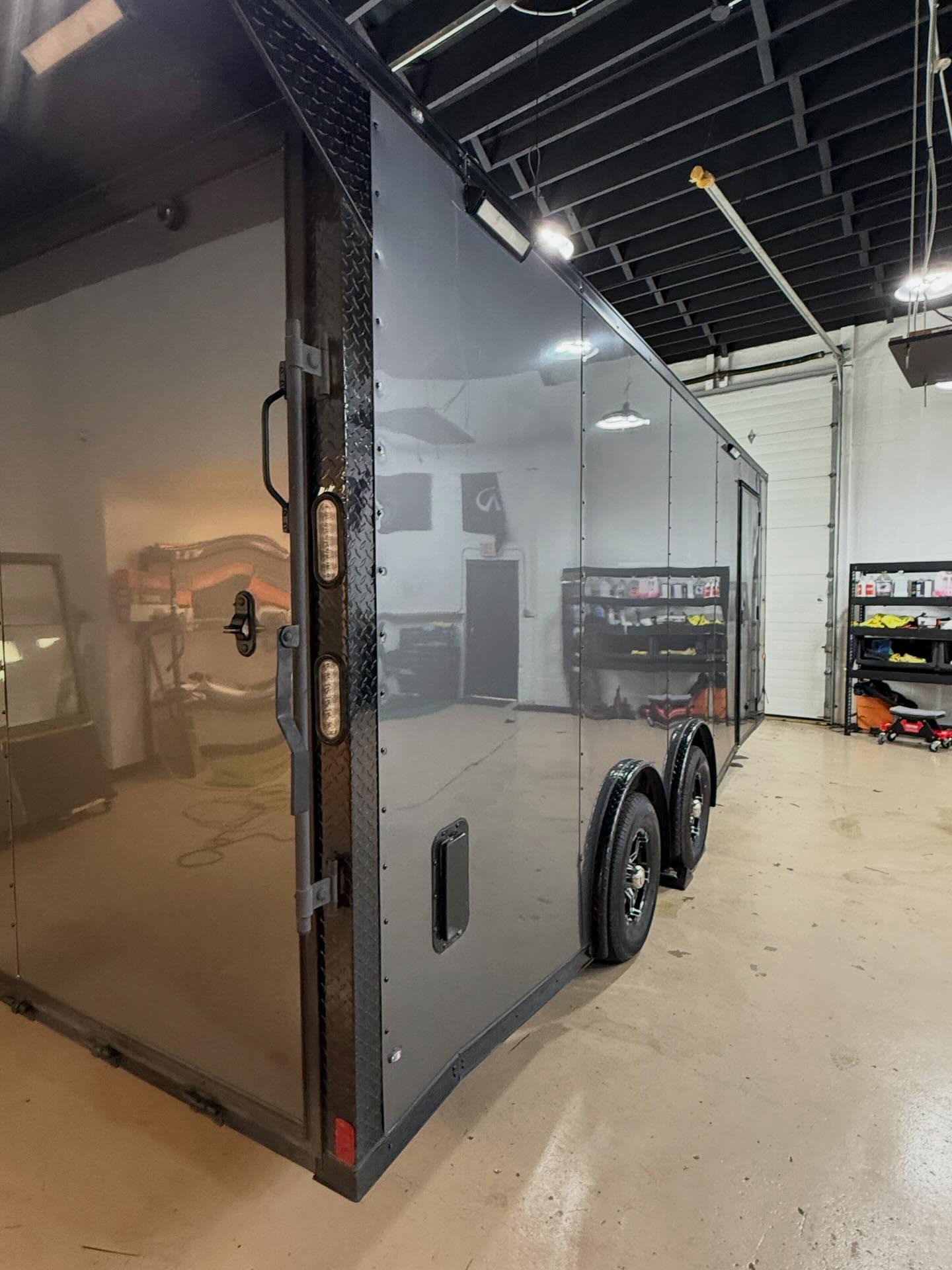 We took this trailer from standard white to a custom Gloss Graphite Metallic you won’t miss on the road. Every bolt was removed and painted black for a clean, cohesive look, then topped off with a ceramic coating for long term protection.Reach out to get your project on the books!#vinylwrap #ᴄᴇʀᴀᴍɪᴄᴄᴏᴀᴛɪɴɢ #worktrailer #greenbaywi #santanasvinylgarage