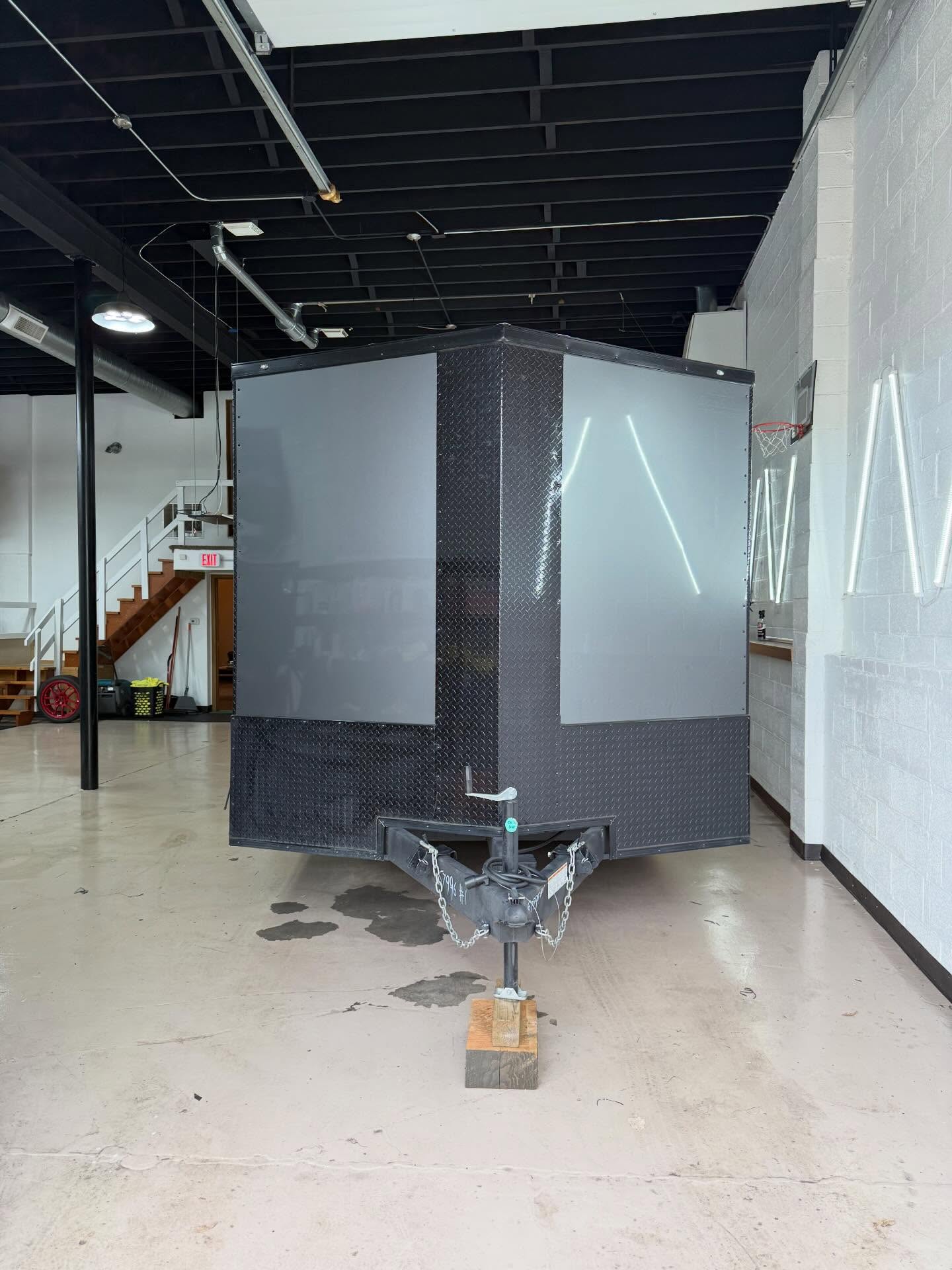 We took this trailer from standard white to a custom Gloss Graphite Metallic you won’t miss on the road. Every bolt was removed and painted black for a clean, cohesive look, then topped off with a ceramic coating for long term protection.Reach out to get your project on the books!#vinylwrap #ᴄᴇʀᴀᴍɪᴄᴄᴏᴀᴛɪɴɢ #worktrailer #greenbaywi #santanasvinylgarage